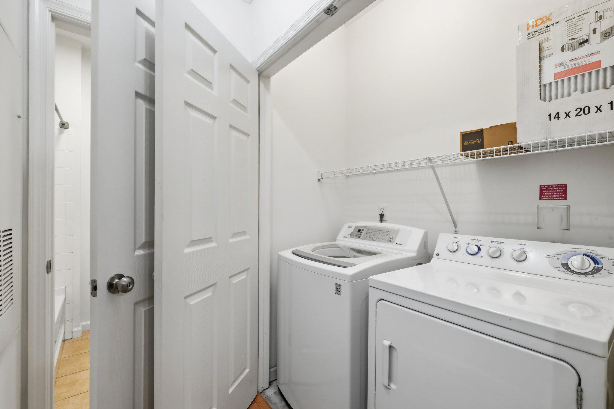 31 Booth Street, Unit B55 Gaithersburg, MD 20878 - Photo 17 of 30 a utility room with dryer and washer