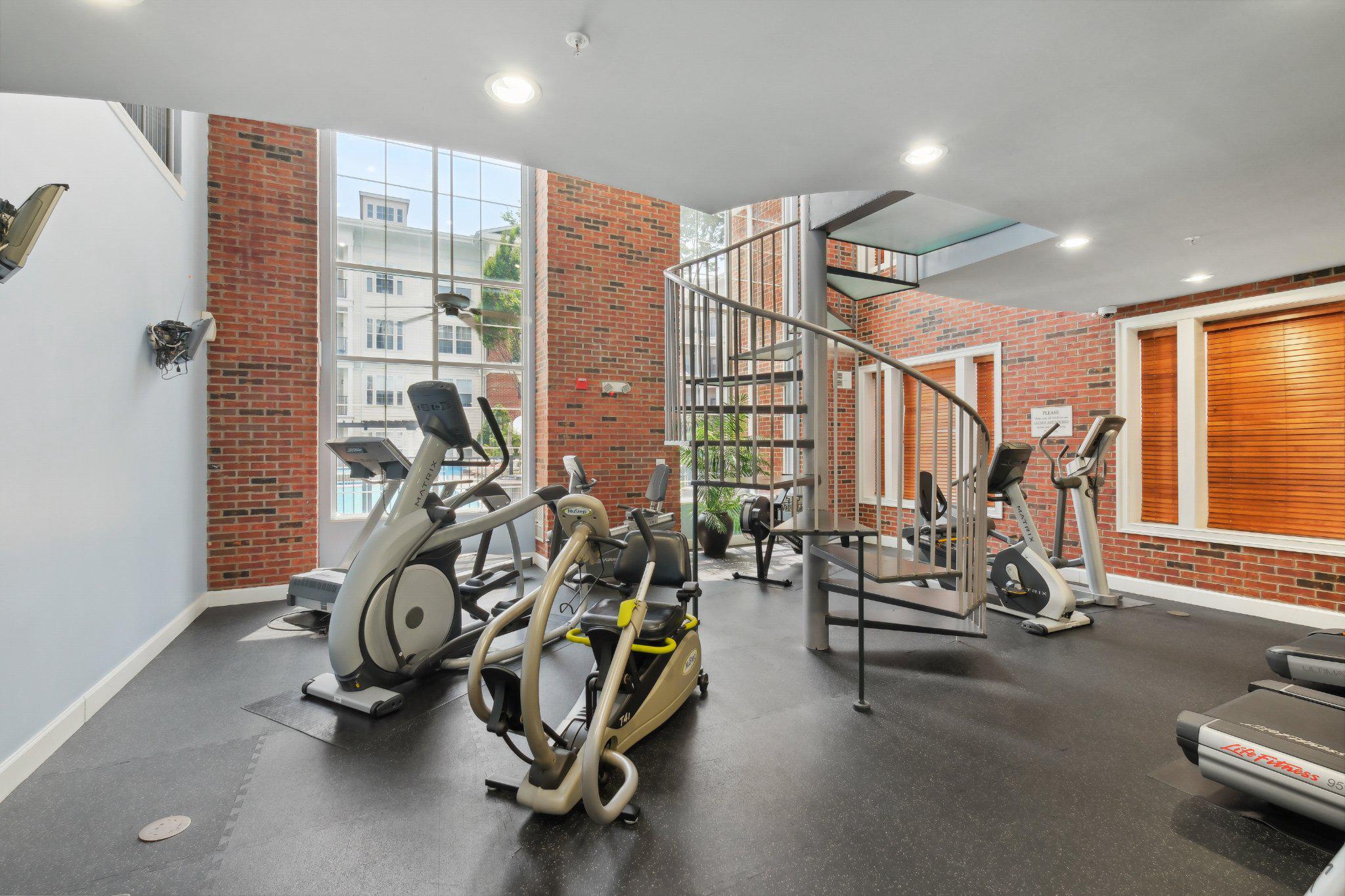 31 Booth Street, Unit B55 Gaithersburg, MD 20878 - Photo 25 of 30 a view of a room with gym equipment