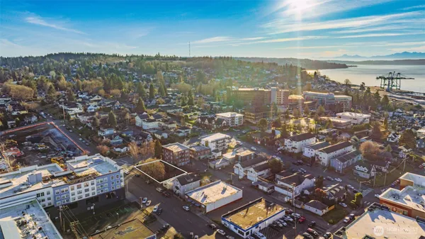 an aerial view of a city with lots of residential buildings