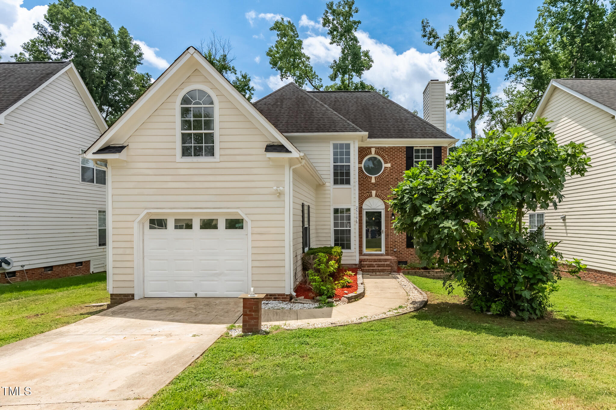2516 Constitution Drive Raleigh, NC 27615 - Photo 1 of 38 a front view of house with yard and green space