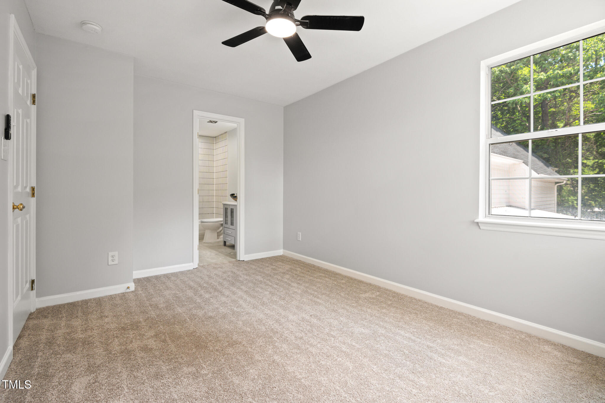 2516 Constitution Drive Raleigh, NC 27615 - Photo 25 of 38 an empty room with window and closet area