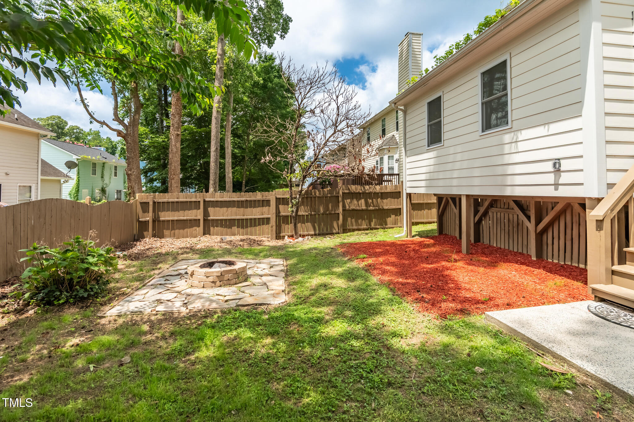 2516 Constitution Drive Raleigh, NC 27615 - Photo 37 of 38 a view of a house with backyard and sitting area