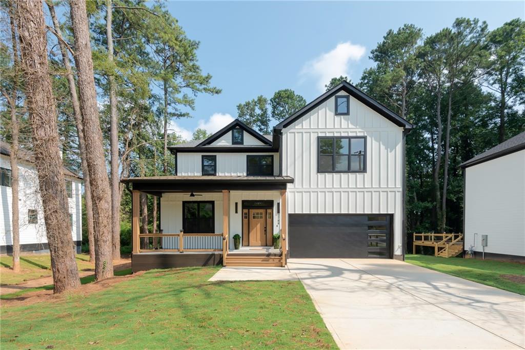 2788 Arborcrest Drive Decatur, GA 30033 - Photo 1 of 1 a front view of a house with a yard and garage