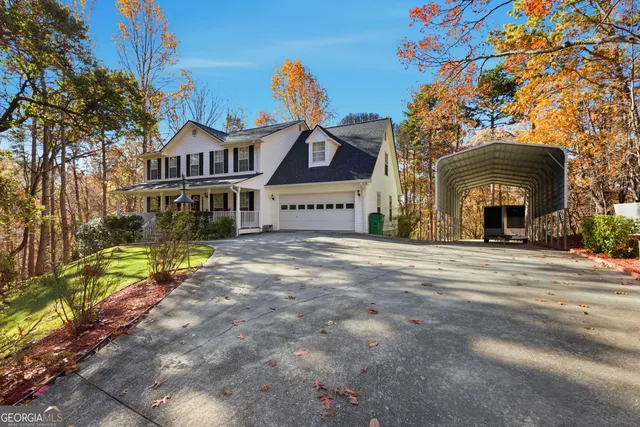 view of a tree with a yard