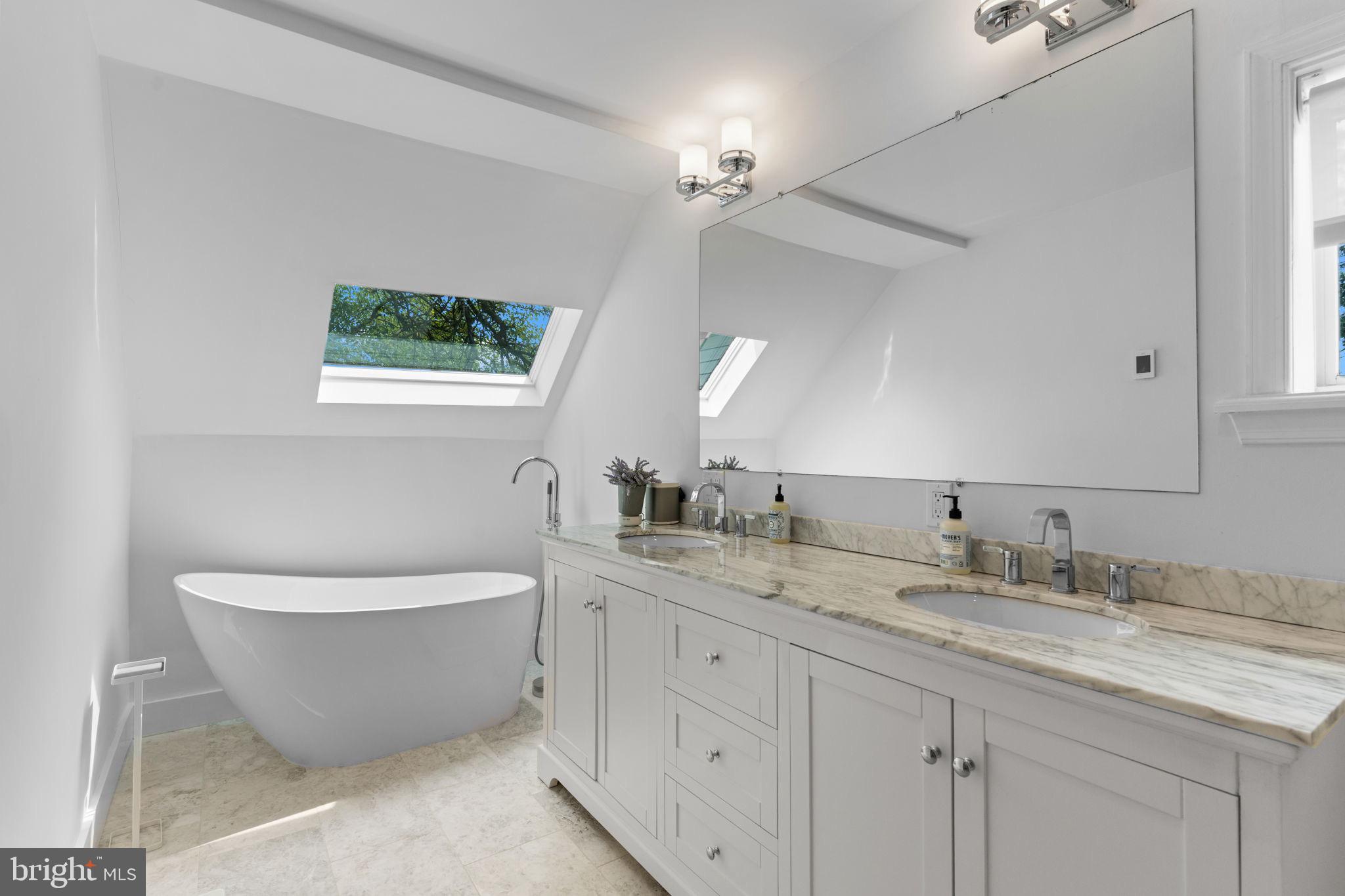 496 East King Road Malvern, PA 19355 - Photo 19 of 35 Elegant bathroom with skylights and modern design.