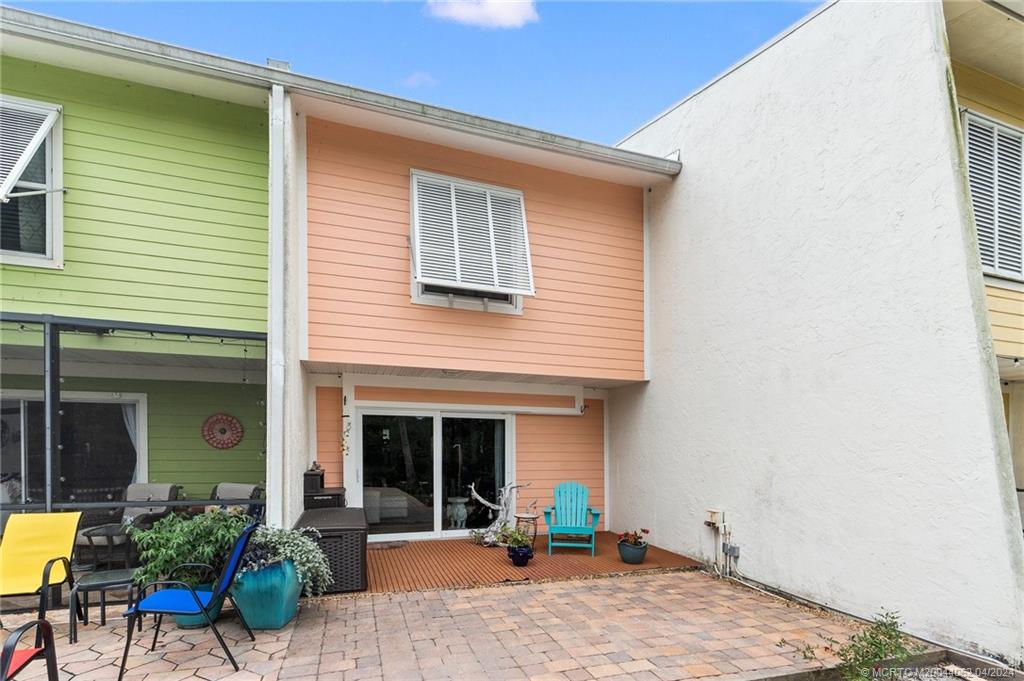 3135 Southeast Indian Street, Unit 5 Stuart, FL 34997 - Photo 33 of 41 a view of a house with patio