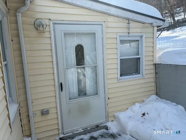 a view of front door and porch