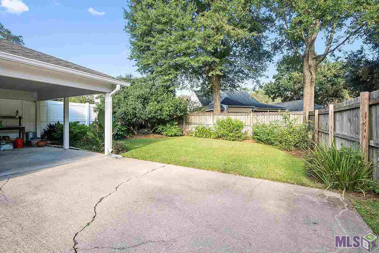 1341 Patrick Drive Baton Rouge, LA 70810 - Photo 16 of 16 Carport and Backyard