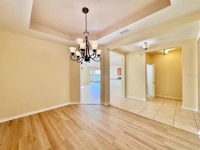 a view of a chandelier in a room