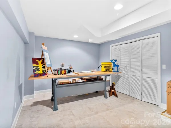 a view of a workspace with furniture