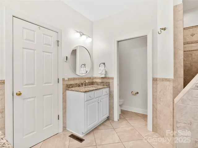 a bedroom with a bed and furniture