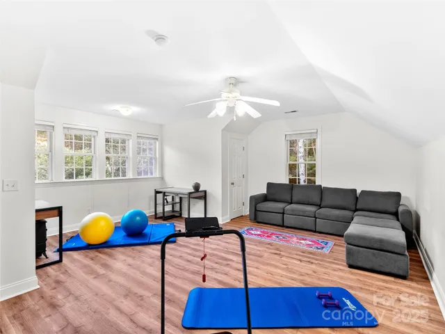 a bedroom with a bed and a closet