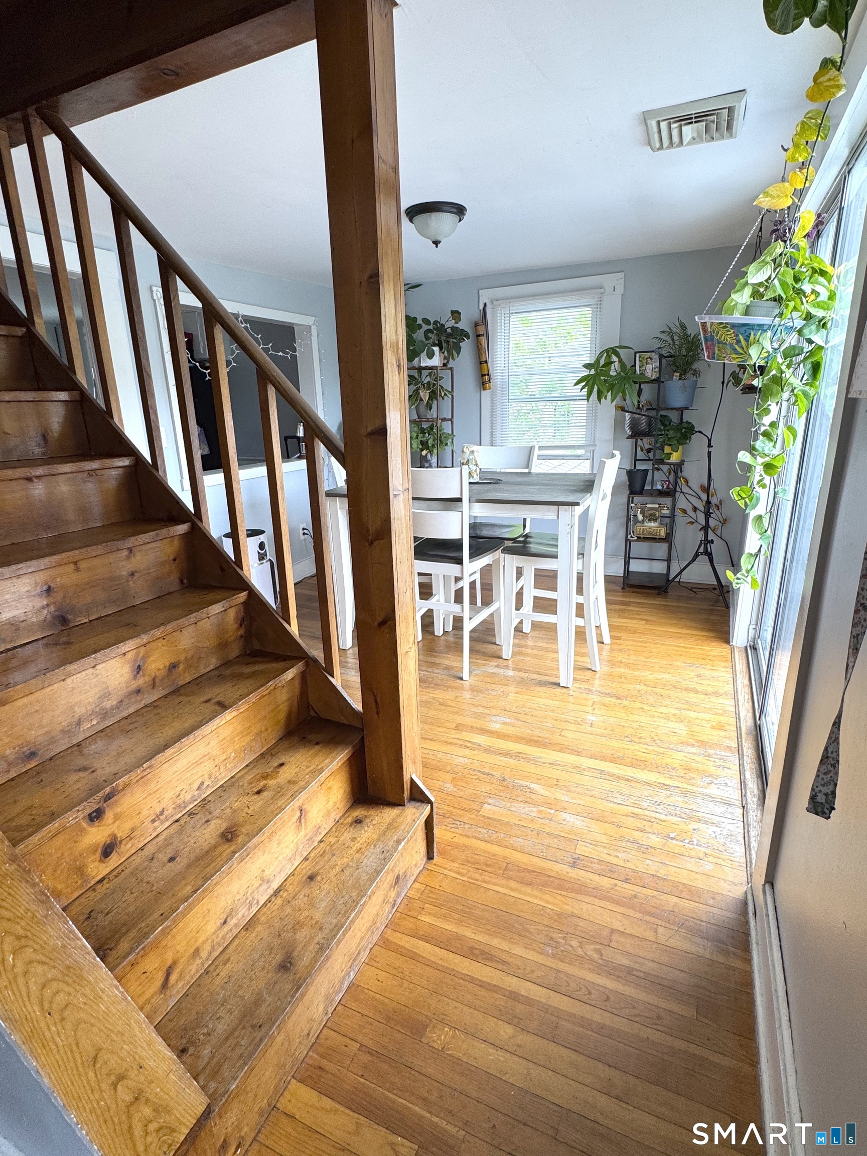 6-8 Vose Street Ansonia, CT 06401 - Photo 21 of 37 2nd floor main entrance/foyer leads into dining area. Another hallway leads into the living room area.