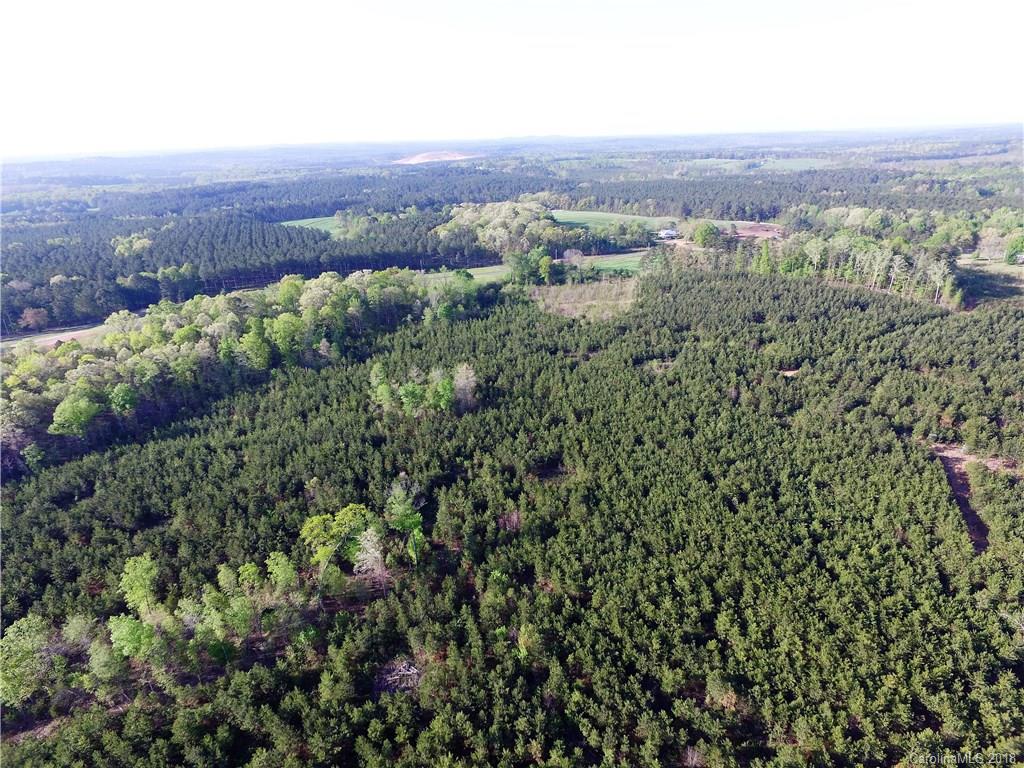 1 Winfield Road Polkton, NC 28135 - Photo 14 of 17 an aerial view of a houses with a lush green hillside