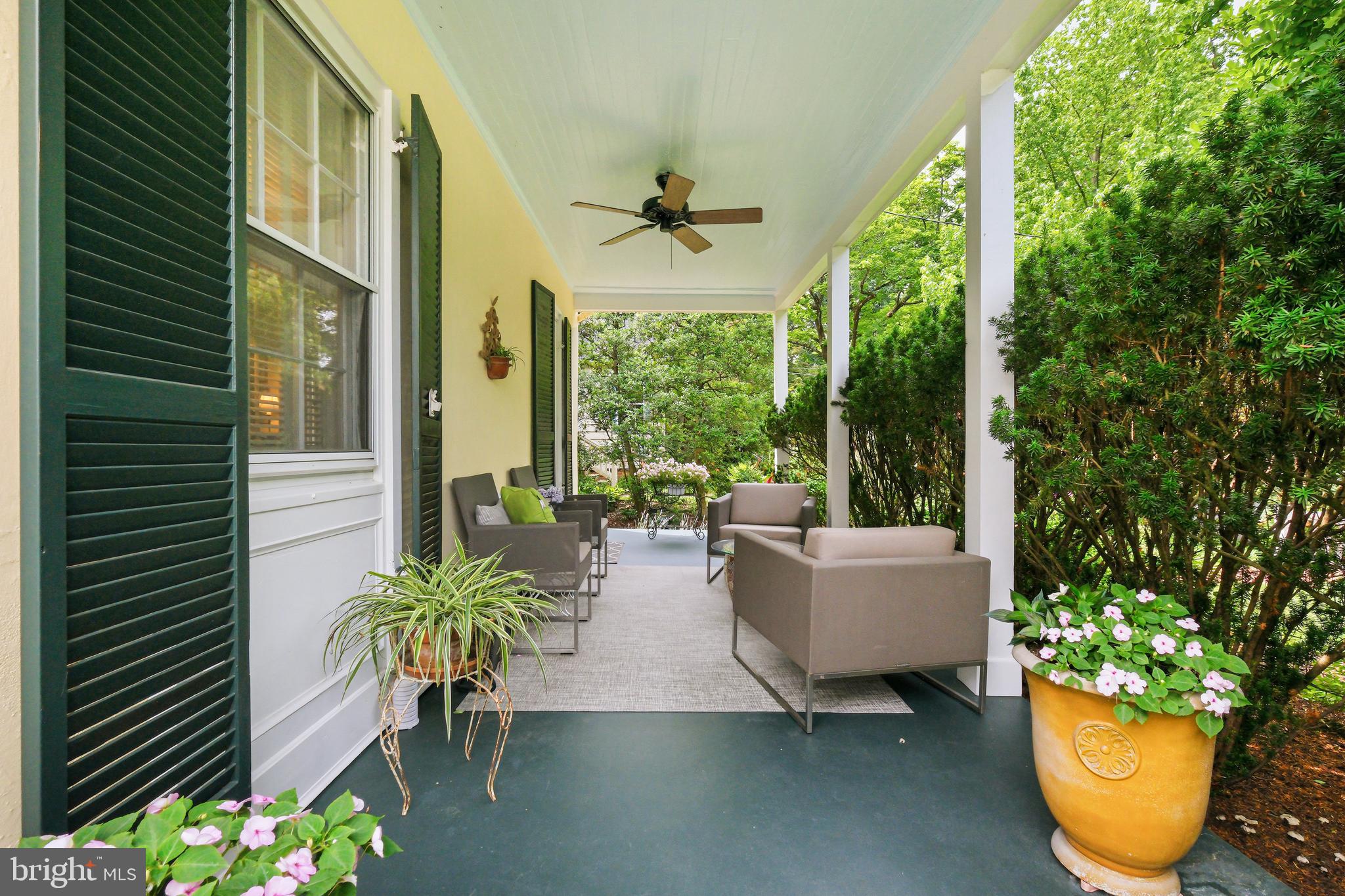 6411 33rd Street Northwest Washington, DC 20015 - Photo 43 of 48 a living room with patio furniture and a potted plant