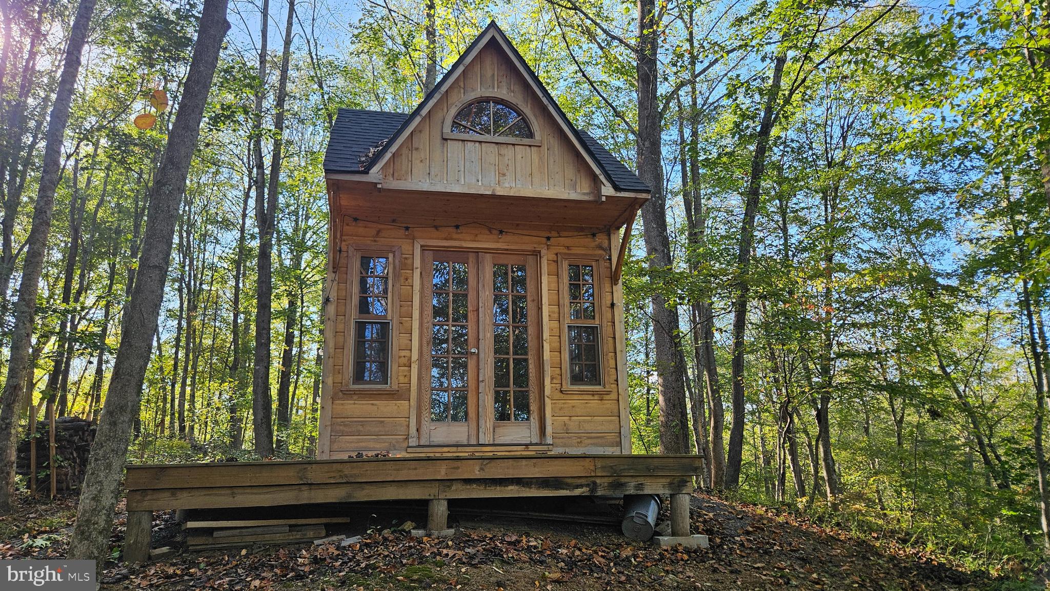 0 Sharp Rock Road Sperryville, VA 22740 - Photo 19 of 31 a view of a house with backyard and sitting area