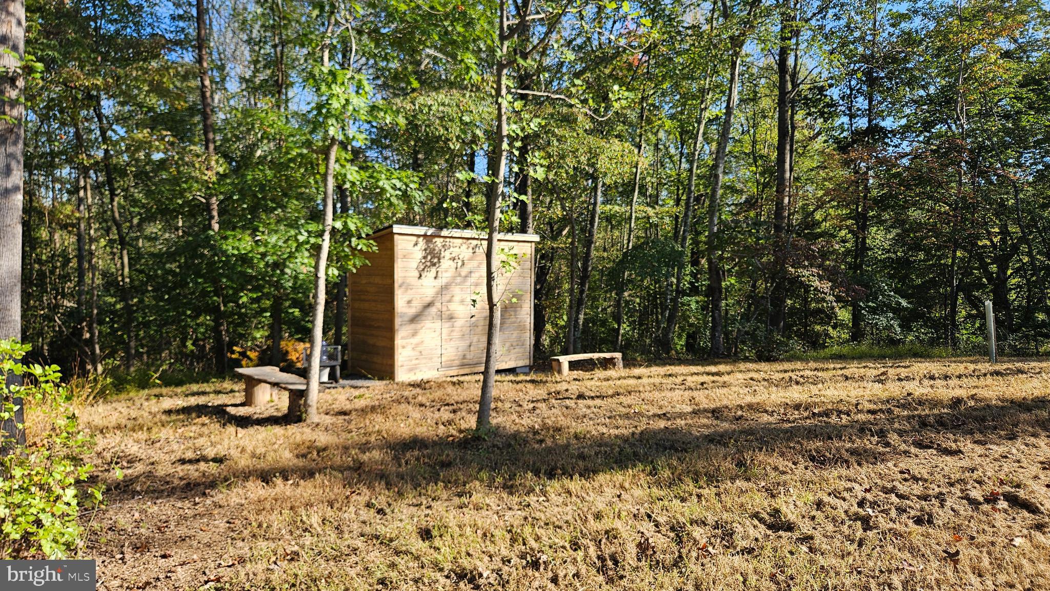 0 Sharp Rock Road Sperryville, VA 22740 - Photo 23 of 31 a backyard of a house with trees