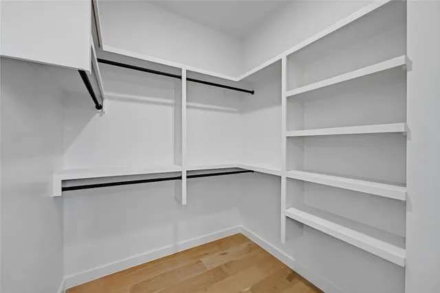 a view of an empty walk in closet