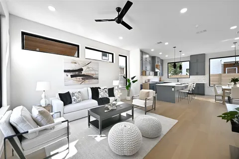 a living room with furniture and a table