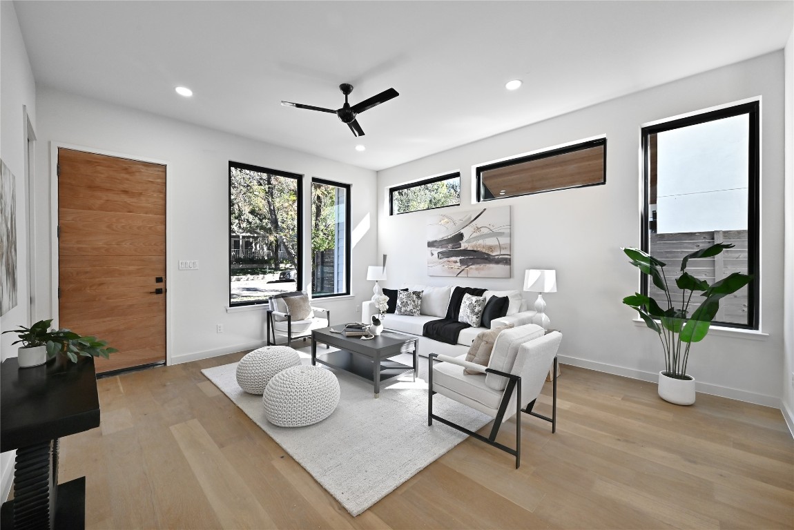 2717 Lyons Road, Unit 1 Austin, TX 78702 - Photo 6 of 35 Living area featuring light wood-type flooring, ceiling fan, and recessed lighting