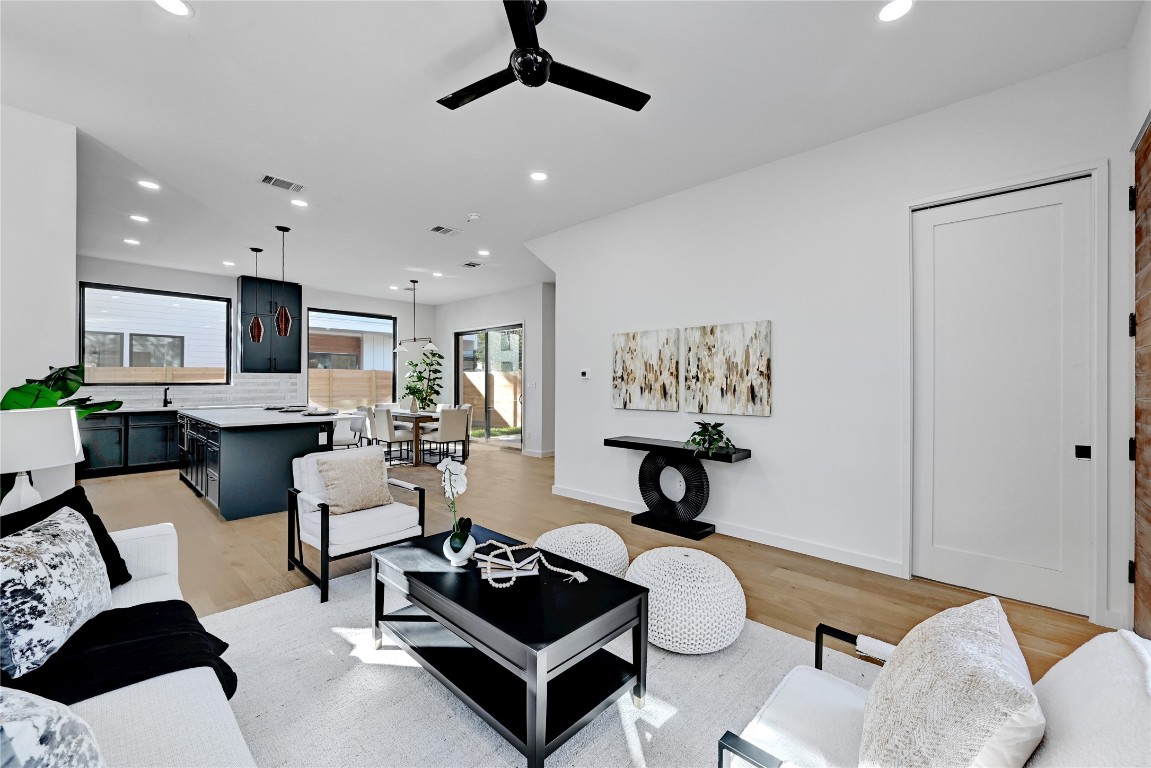 2717 Lyons Road, Unit 1 Austin, TX 78702 - Photo 7 of 35 Living area with recessed lighting, light wood-style floors, and a ceiling fan