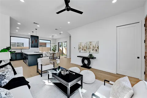 a living room with furniture and a table
