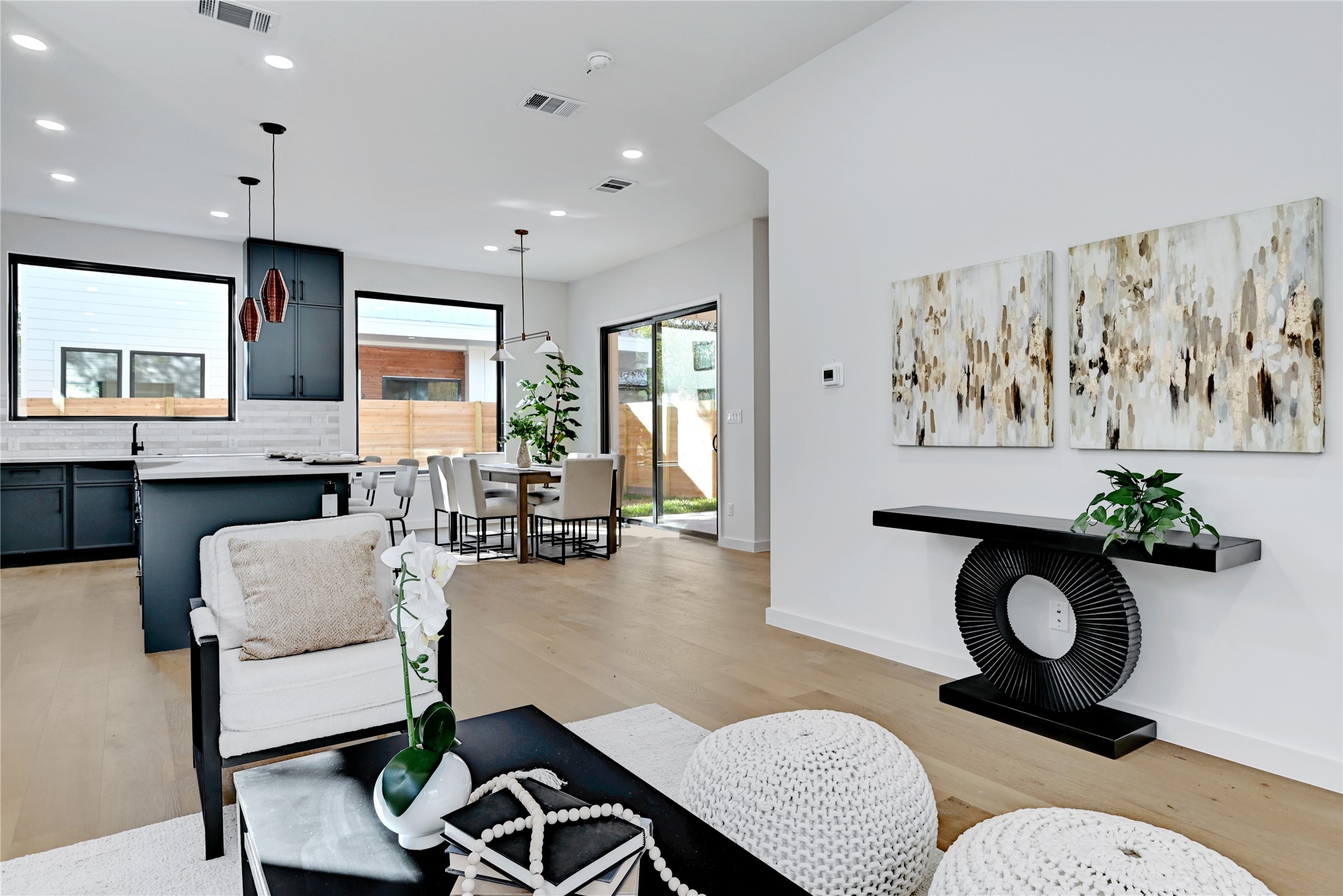 2717 Lyons Road, Unit 1 Austin, TX 78702 - Photo 9 of 35 Living room with light wood-style flooring and recessed lighting