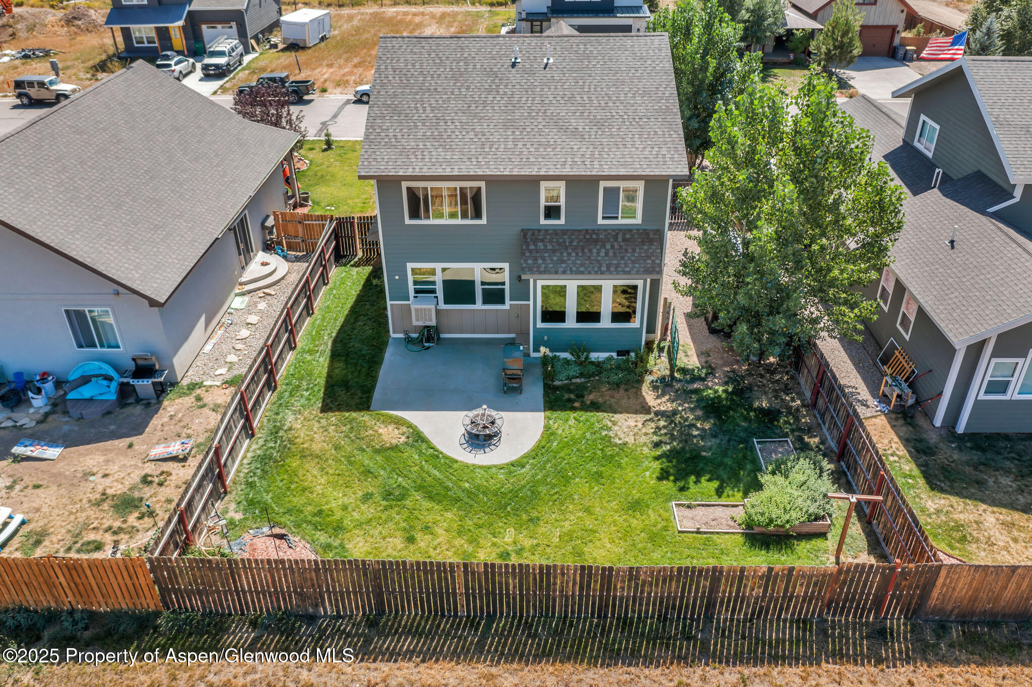 875 Dry Creek Road Hayden, CO 81639 - Photo 39 of 40 a aerial view of a house with swimming pool and a yard