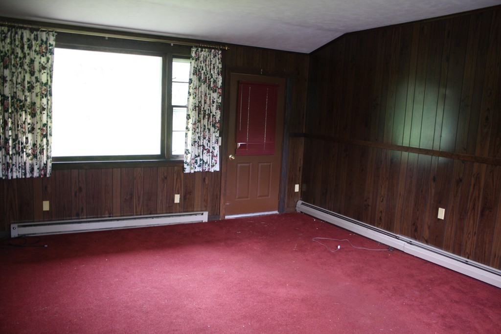 5 West Gill Road Gill, MA 01354 - Photo 4 of 8 an empty room with windows