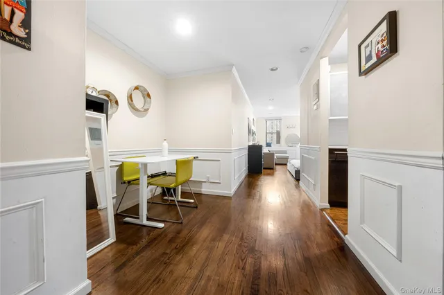 a view of a living room and dining room