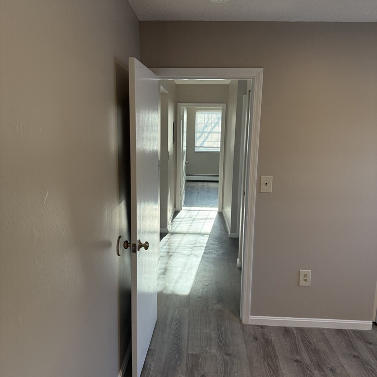 509 Chatham Street, Unit C Lynn, MA 01902 - Photo 4 of 9 wooden floor in a gallery