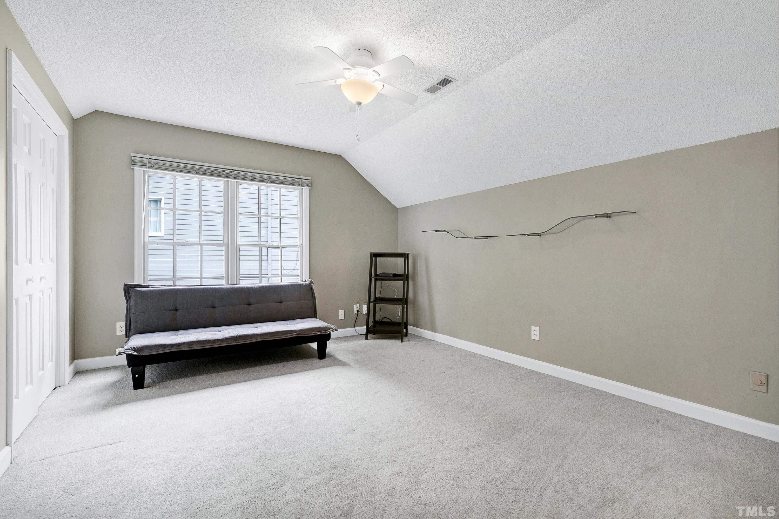 117 Trailing Oak Cary, NC 27513 - Photo 21 of 32 a view of an empty room with a window