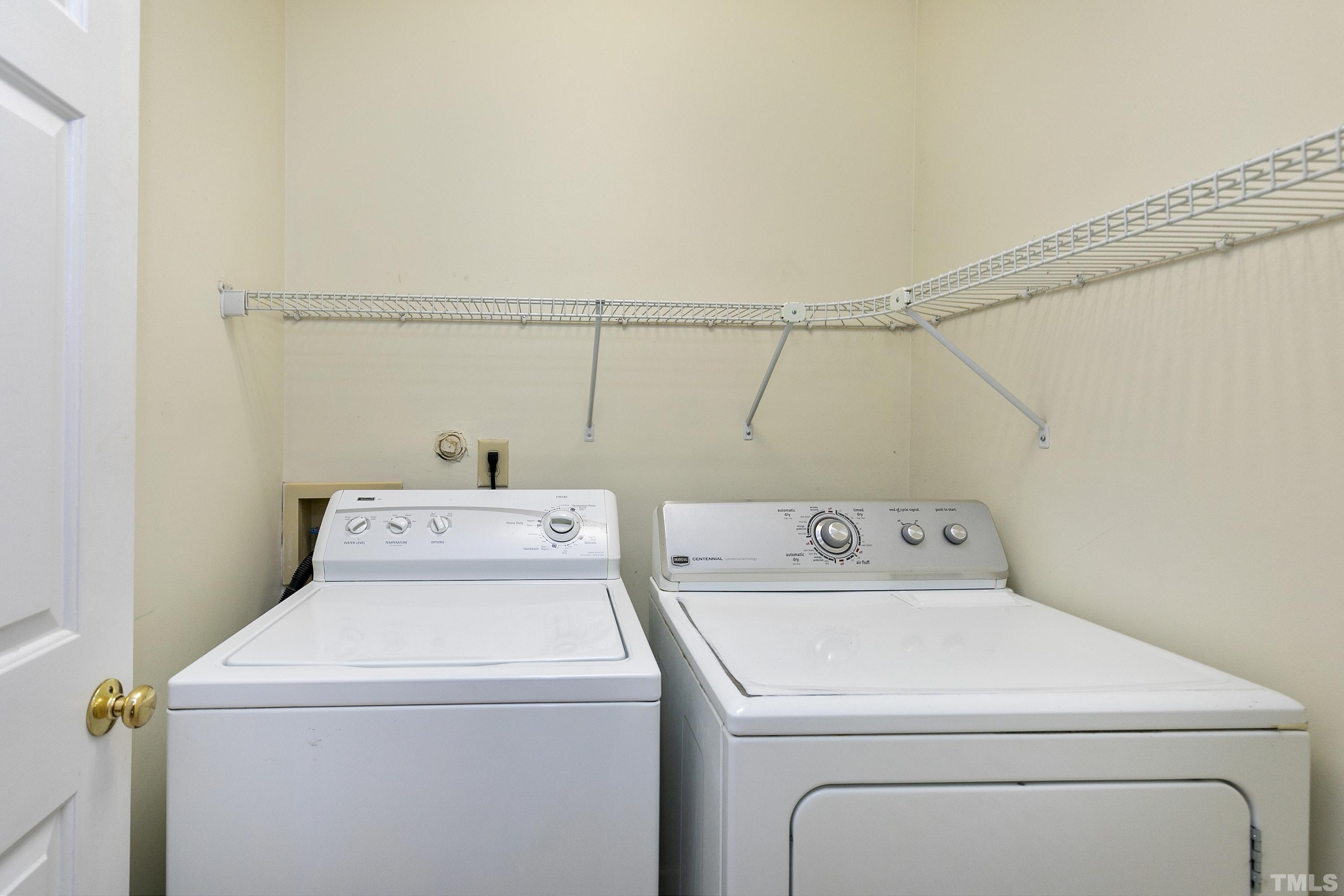 117 Trailing Oak Cary, NC 27513 - Photo 23 of 32 a utility room with dryer and washer