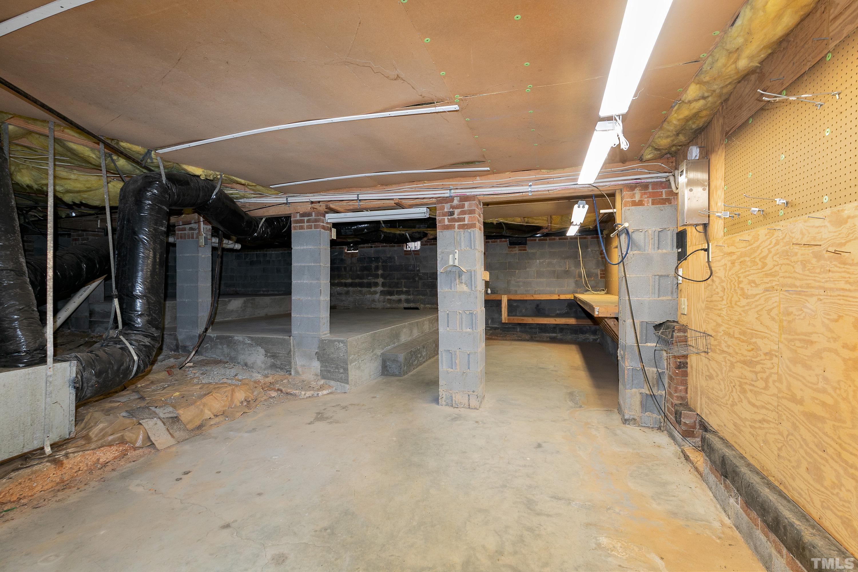 117 Trailing Oak Cary, NC 27513 - Photo 26 of 32 a view of storage and utility room