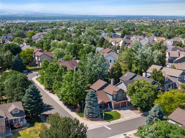 an aerial view of residential house with outdoor space