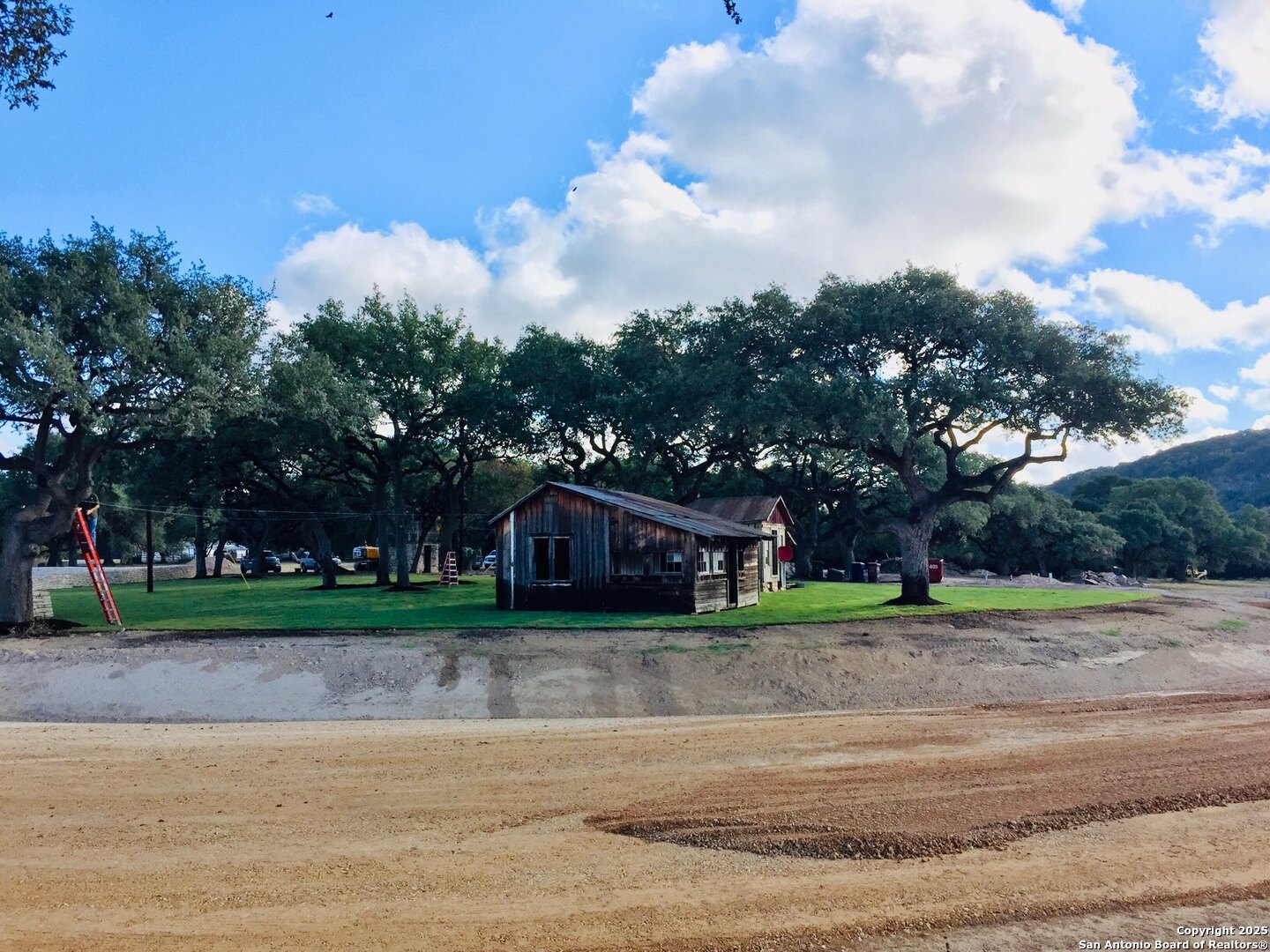831 Wade Road New Braunfels, TX 78132 - Photo 16 of 35 a view of street with trees and grass