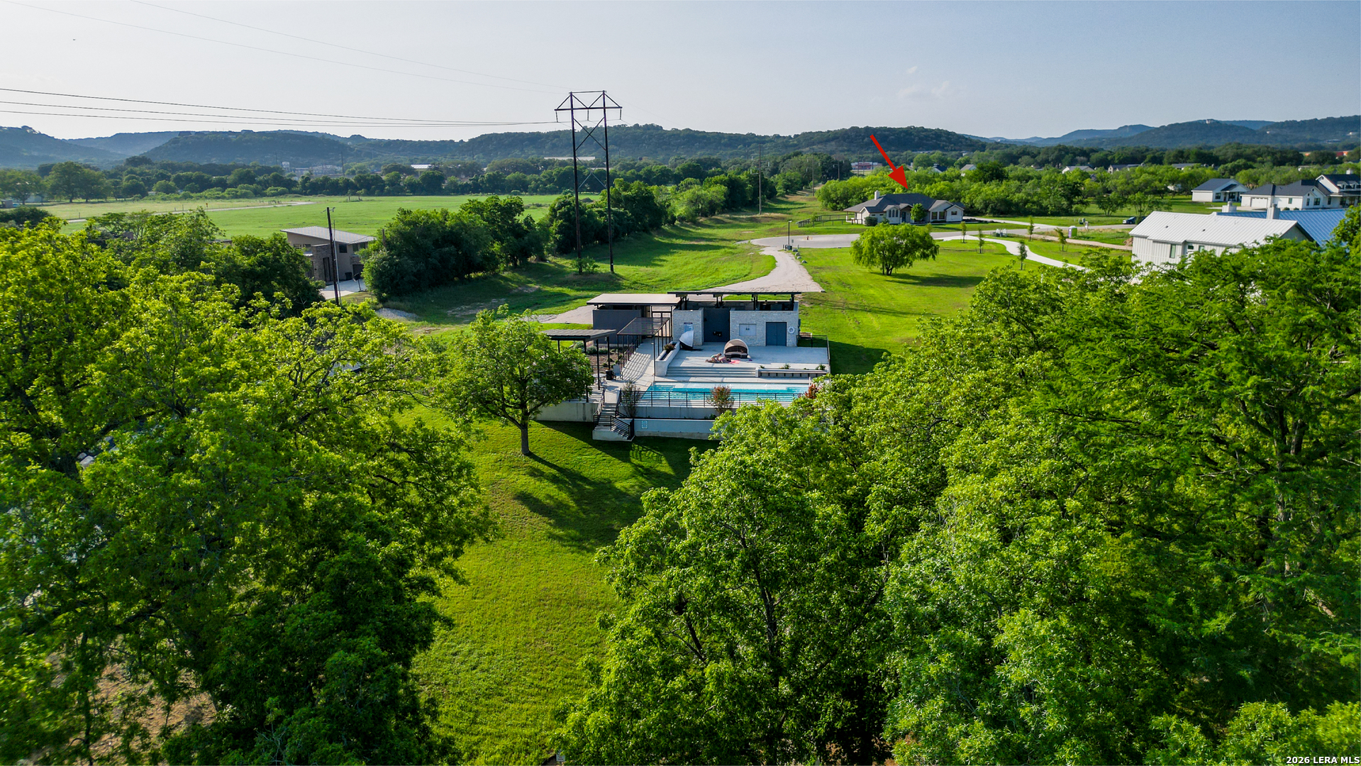 831 Wade Road New Braunfels, TX 78132 - Photo 26 of 35 a view of a lake with a yard