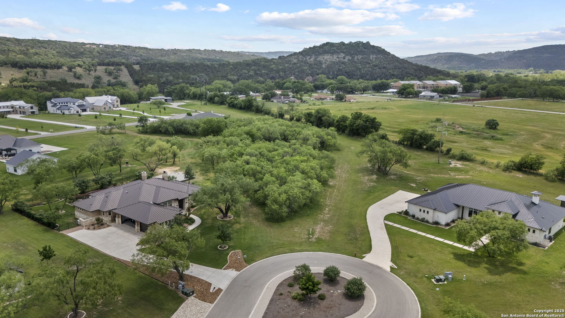 831 Wade Road New Braunfels, TX 78132 - Photo 9 of 35 an aerial view of a house with a garden