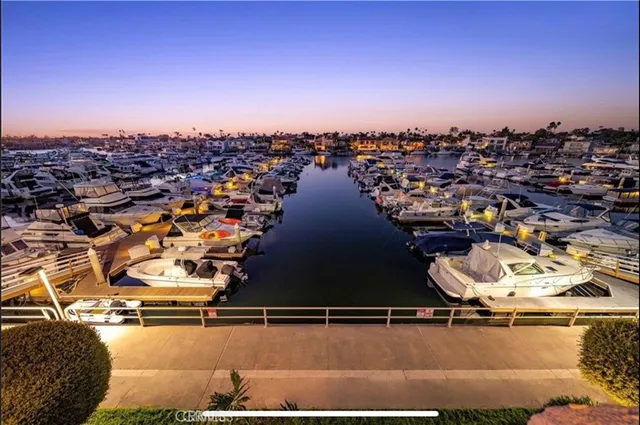 a view of a swimming pool with outdoor seating