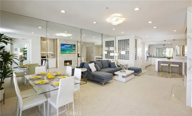 a kitchen with stainless steel appliances granite countertop a stove and a refrigerator