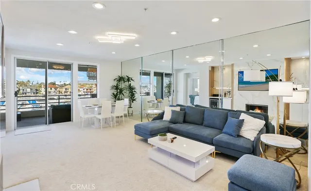 a bedroom with furniture and a chandelier