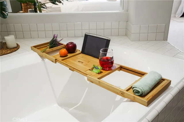 a bedroom with a bed and lamp