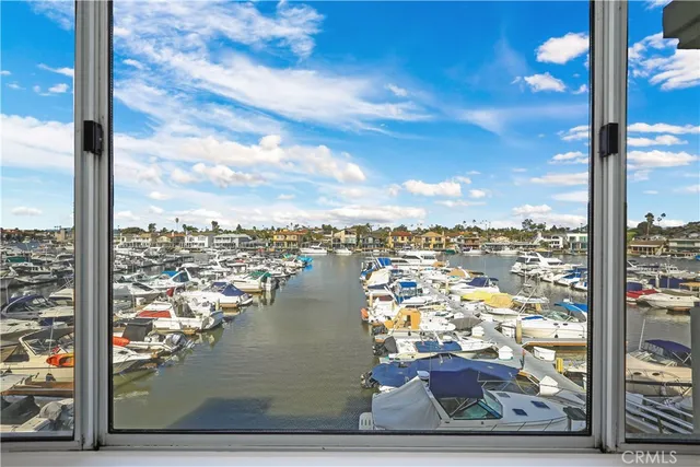 a living room with furniture and a black appliances