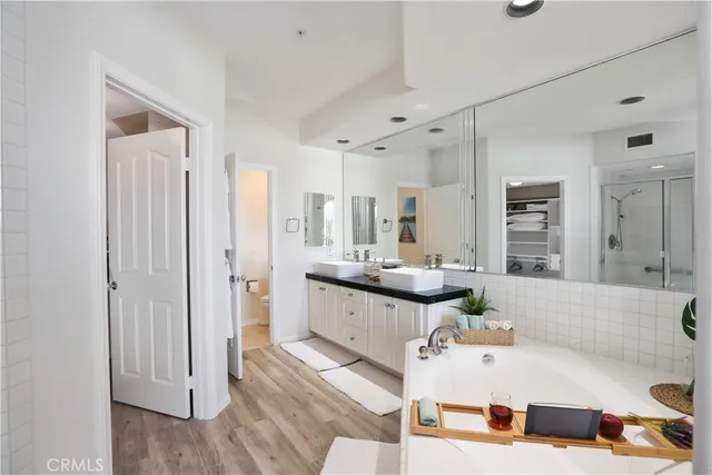 a room with a dresser and a window