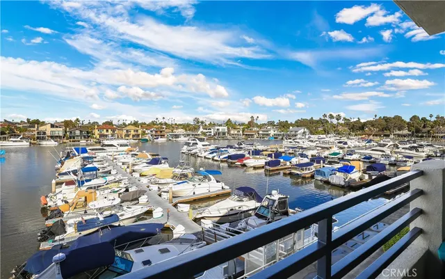 a view of a room with wooden floor and outdoor space