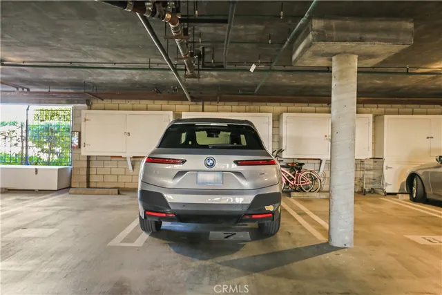a view of a balcony with chairs