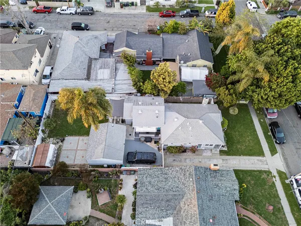 an aerial view of multiple houses with outdoor space