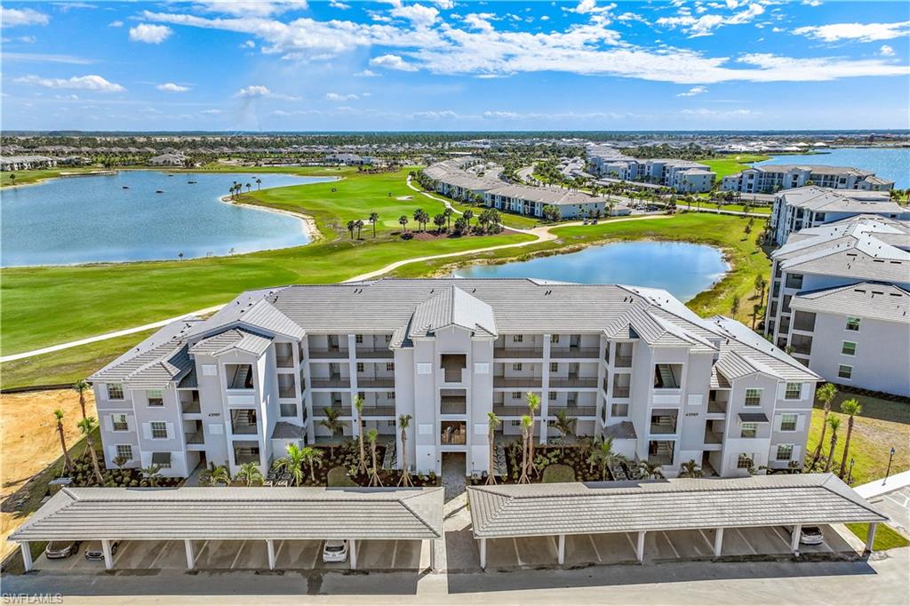 43989 Boardwalk Loop, Unit 2025 Babcock Ranch, FL 33982 - Photo 13 of 14 a view of building with outdoor space