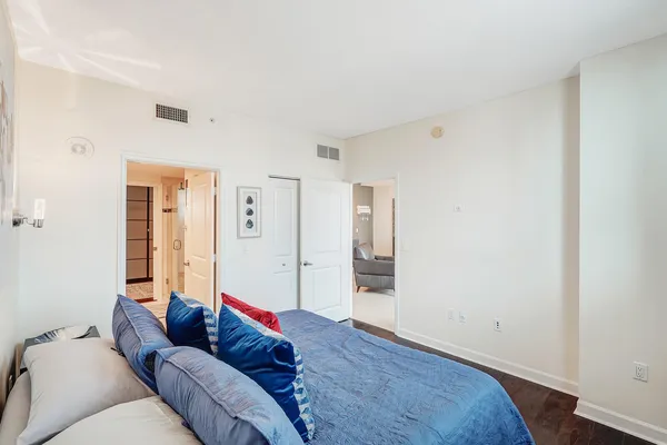 a living room with furniture and a rug
