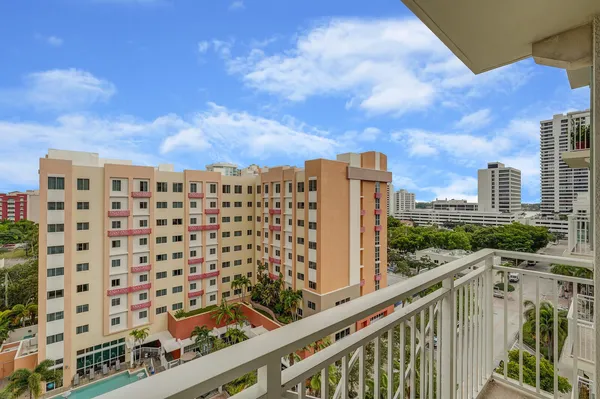 a view of a balcony with city view